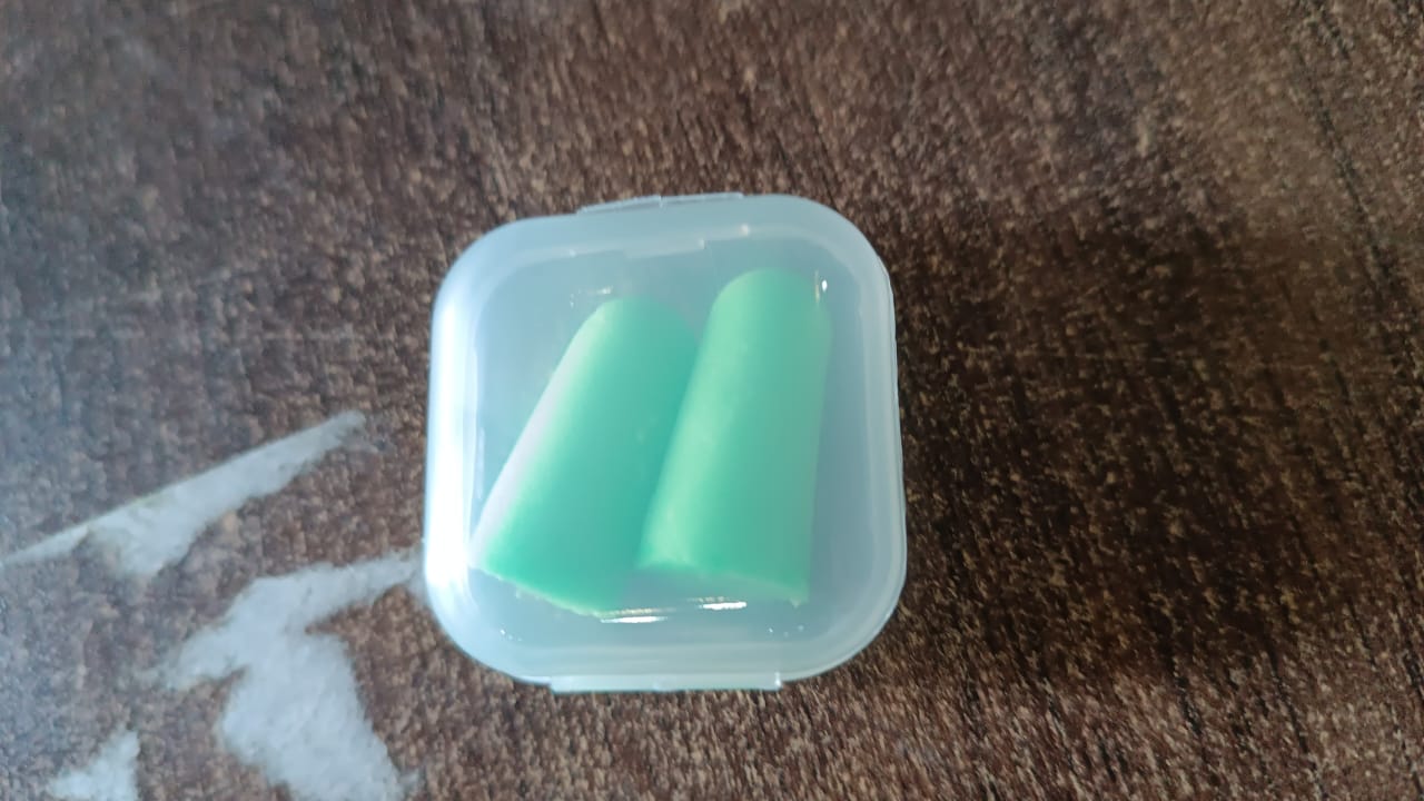 Wukusy foam earplugs for noise reduction, pair of soft disposable ear protection for hearing safety and noise control.