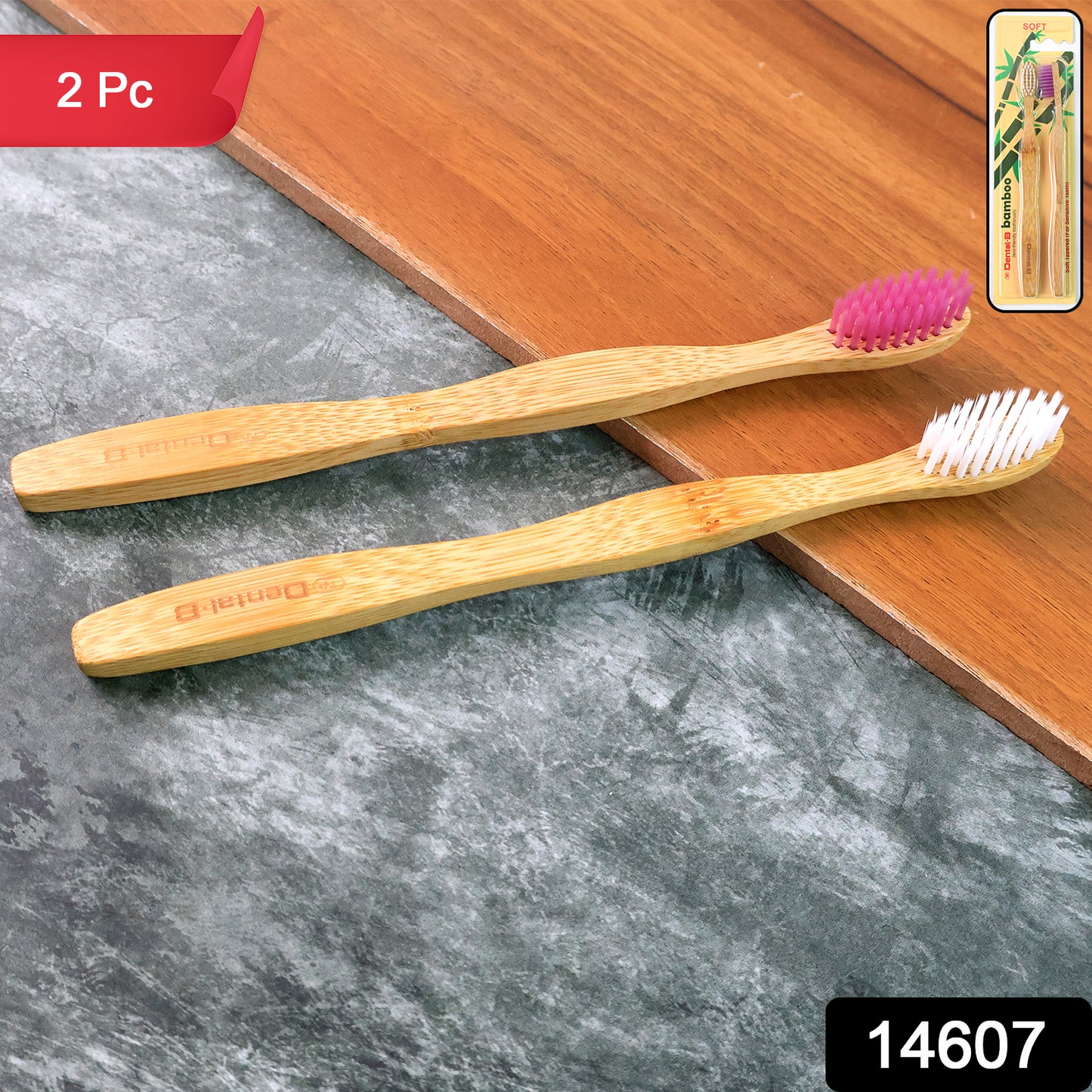 Two Wukusy eco-friendly bamboo toothbrushes with medium bristles, natural wood finish, and sleek design for sustainable dental care.