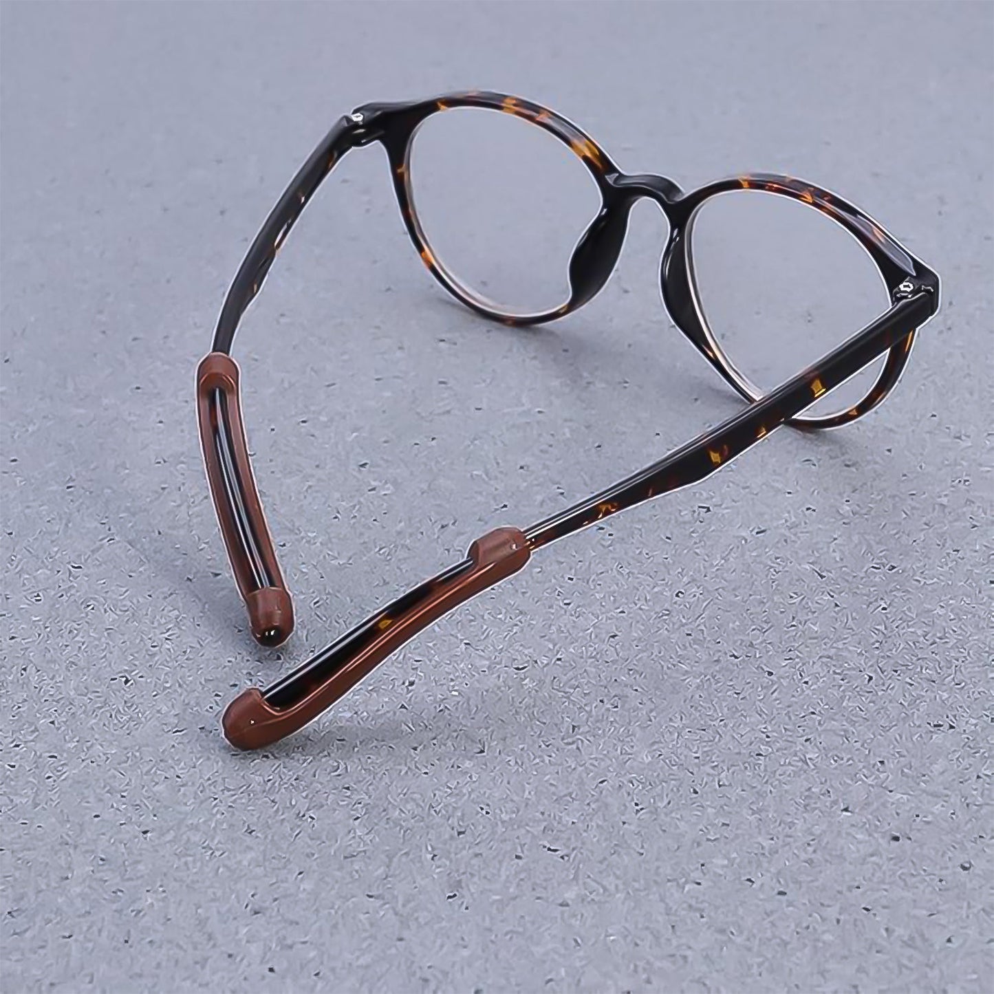 Wukusy soft silicone eyeglass anti-slip ear grips, one pair, designed to secure glasses comfortably with color may vary.