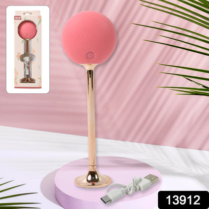 Wukusy Face Spa Massage Hammer, vibrating facial massage tool for skin care and relaxation, in a sleek black design.