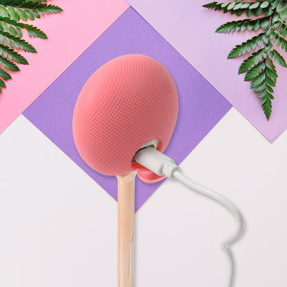 Wukusy Face Spa Massage Hammer, vibrating facial massage tool for skin care and relaxation, in a sleek black design.