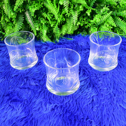 Set of three Wukusy glass tumblers and one cup for health care, featuring clear glass design and comfortable grip.