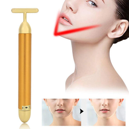 Wukusy Golden Energy Face Massager in black and gold, handheld device for facial skincare and rejuvenation.