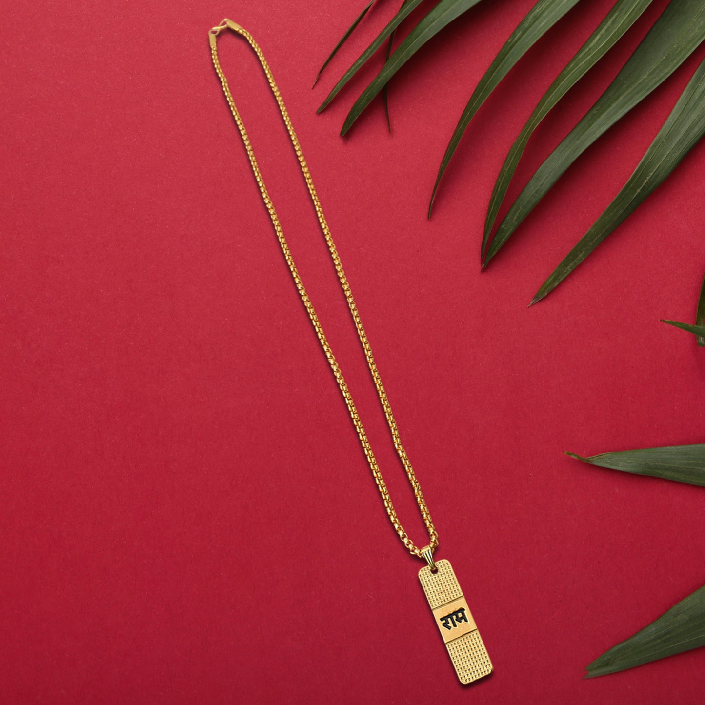 Golden Ram Naam Locket with chain by Wukusy, featuring intricate design, worn as a spiritual health care jewelry piece.