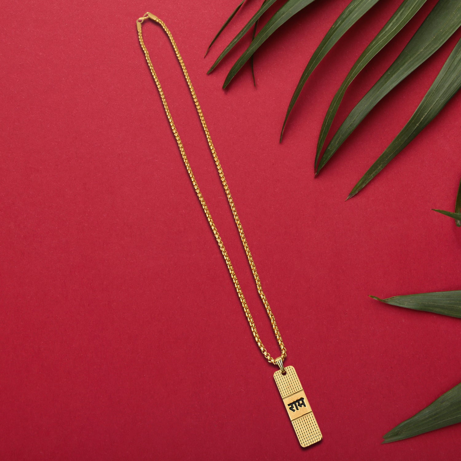 Golden Ram Naam Locket with chain by Wukusy, featuring intricate design, worn as a spiritual health care jewelry piece.