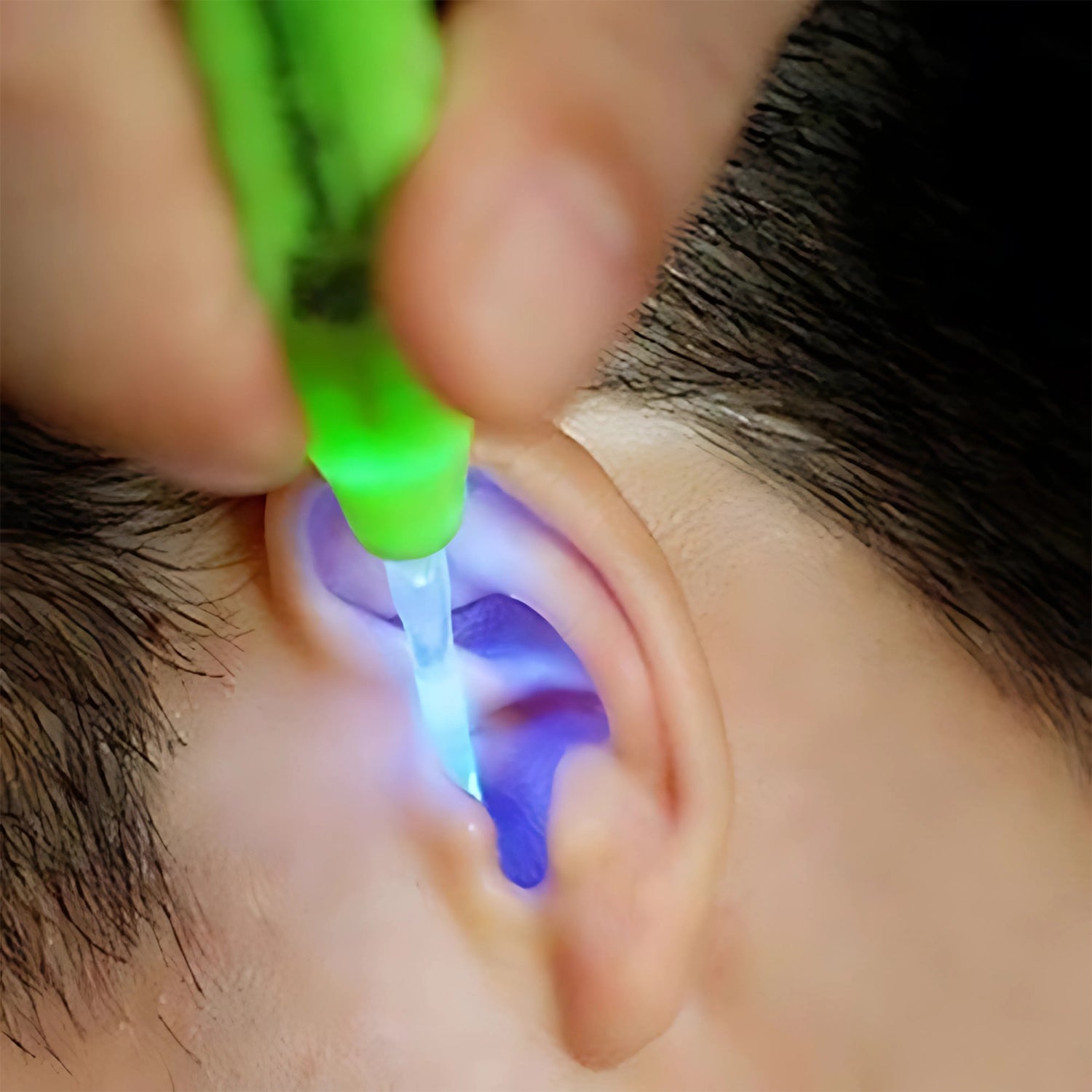 Green LED flashlight earpick with tweezer from Wukusy, a health care tool for ear cleaning and precision removal.