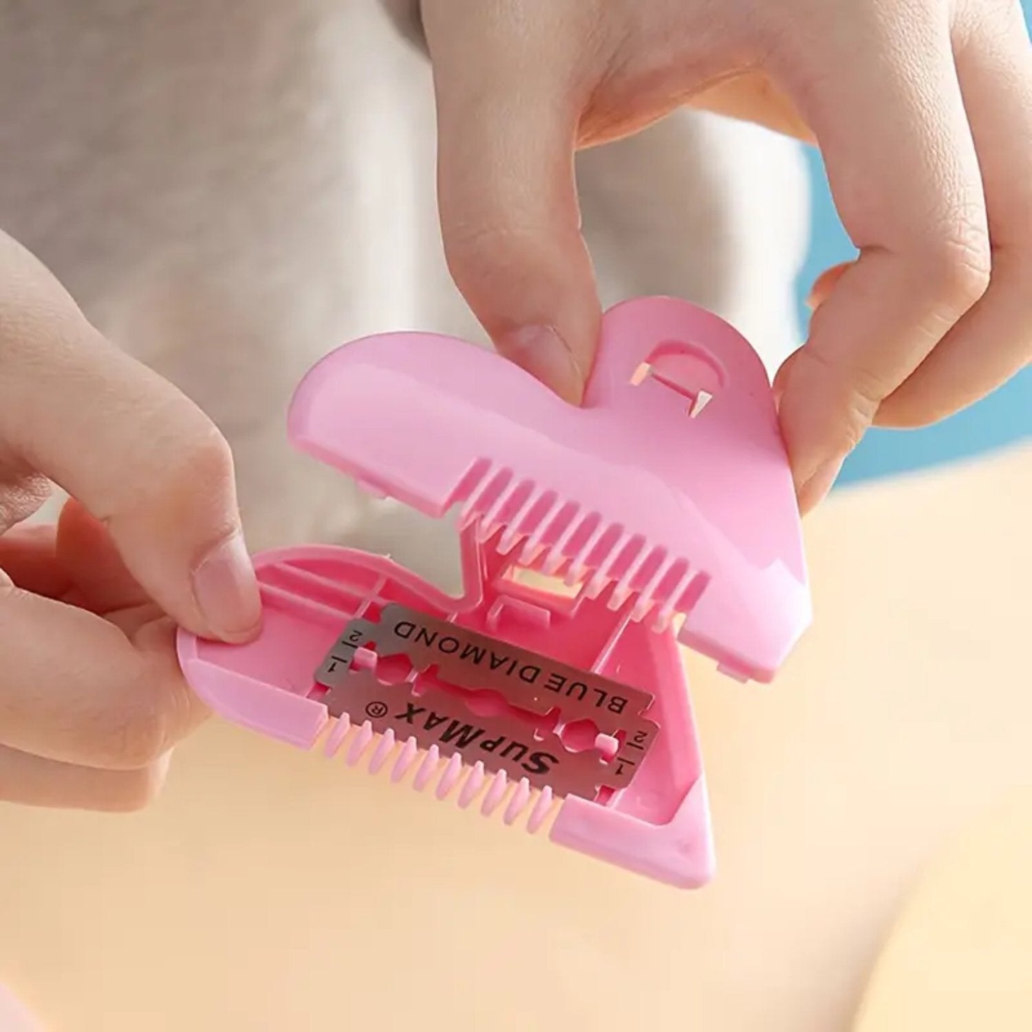 Heart-shaped plastic hair cutting scissors by Wukusy, shown with card packaging, designed for health care and hair trimming.