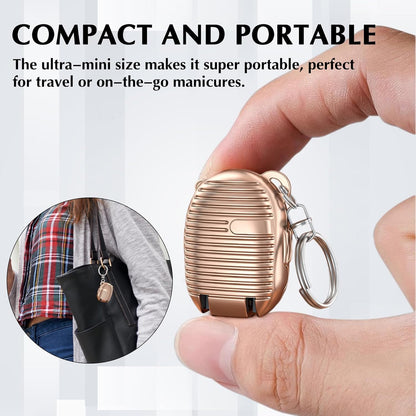 Multicolor Wukusy keychain nail clipper, small and portable nail scissors for personal grooming, shown in close-up.