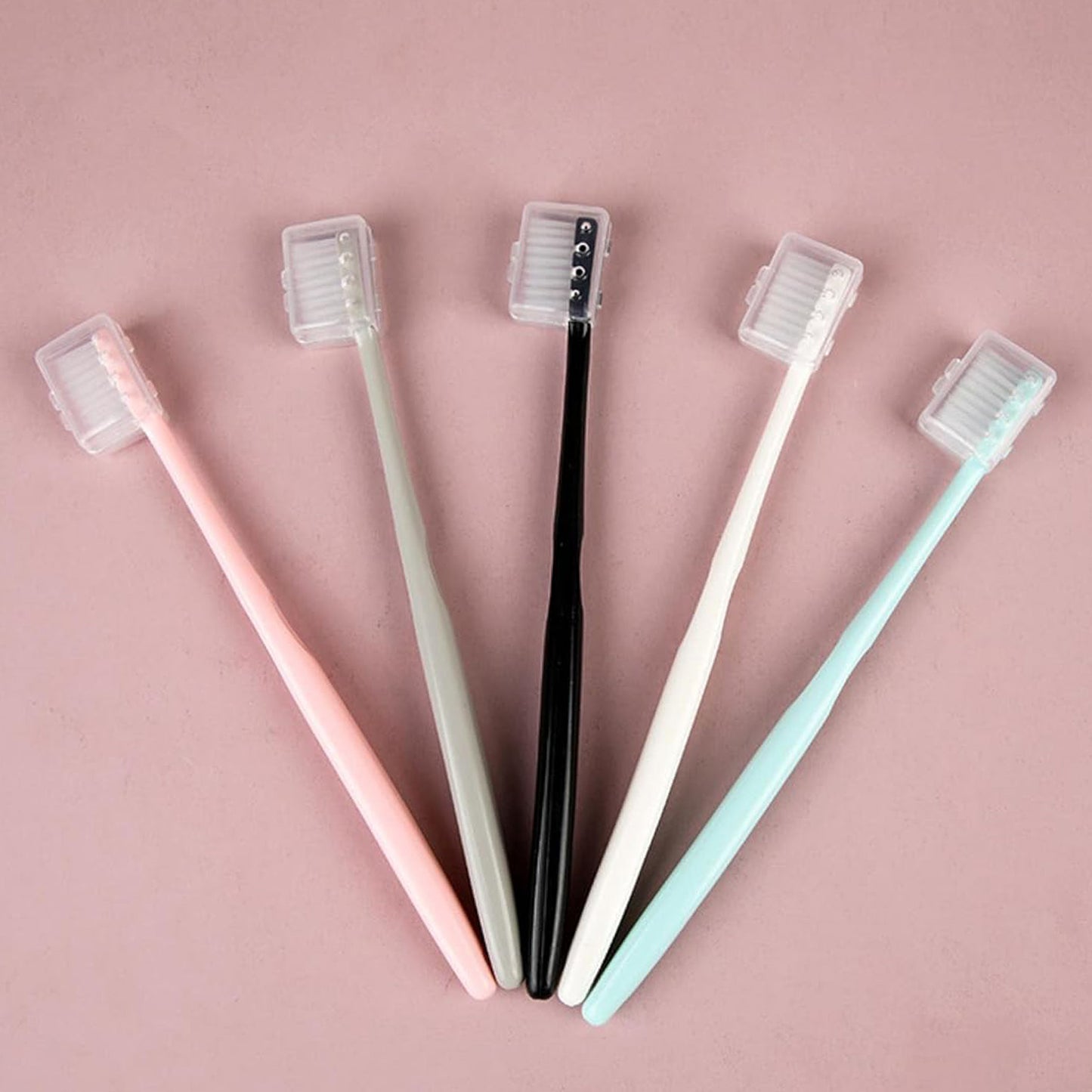 Set of 10 Wukusy kids and adults ultra-soft bristled toothbrushes with protective covers, ideal for gentle daily oral care.