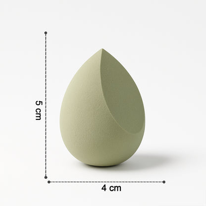 Multicolor Wukusy makeup sponge for blending liquid foundations, powders, and creams, 1 piece, soft and versatile beauty tool.