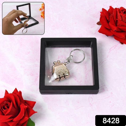 Wukusy health care nail clipper keychain with 3D floating frame display case, compact and portable grooming accessory.