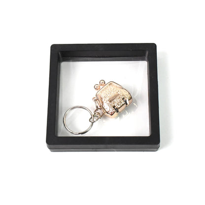 Wukusy nail clipper keychain with 3D floating frame display case, compact health care accessory in a set.