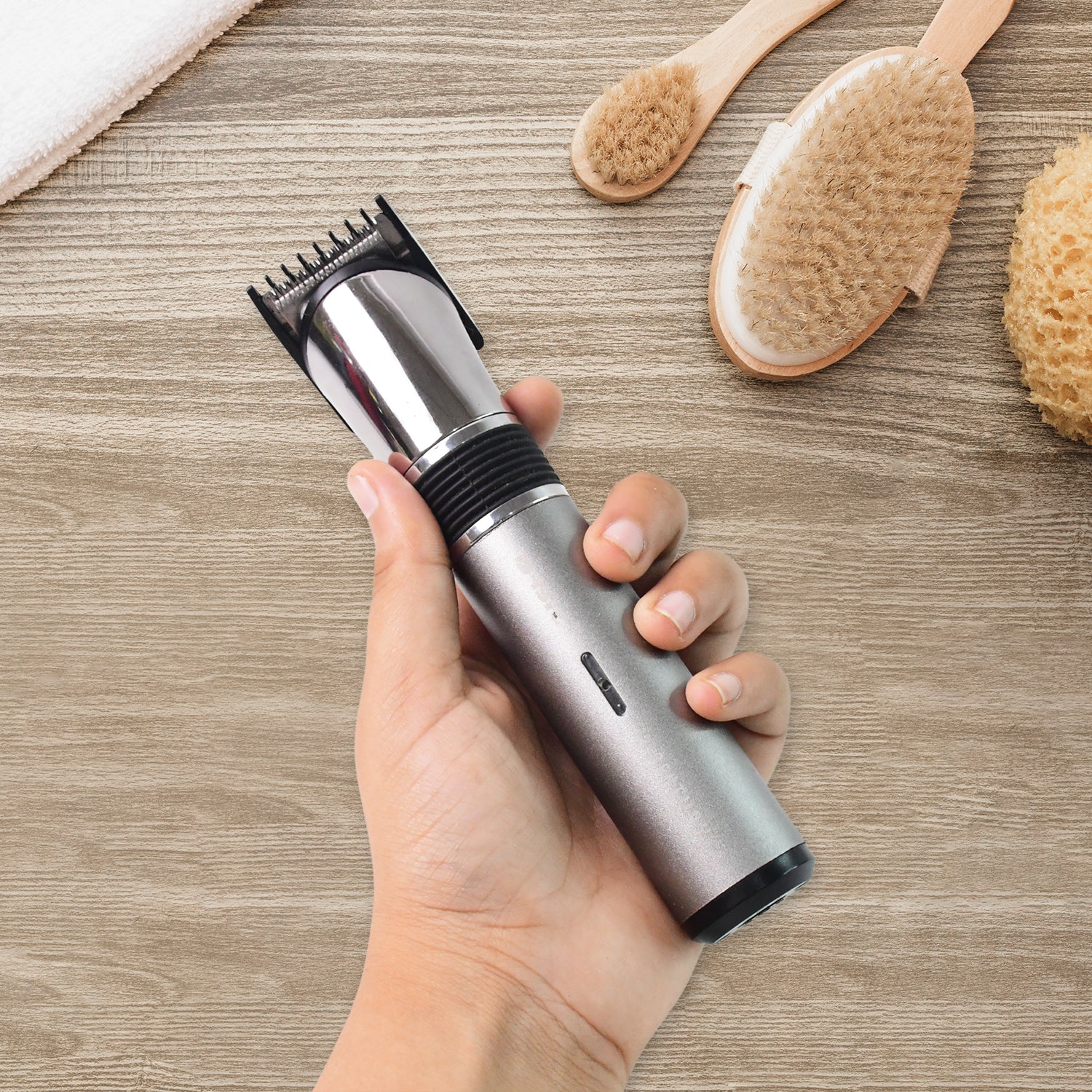 Wukusy Orbit rechargeable hair trimmer for men, health care device with adjustable blades and ergonomic design for grooming.
