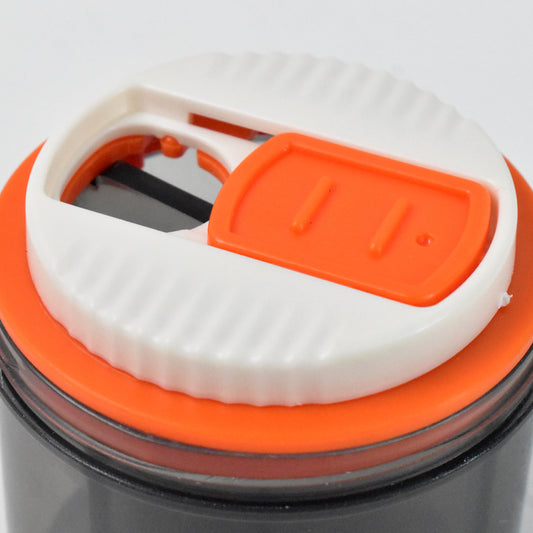 Plastic 4-section pill box organizer by Wukusy in mixed colors, ideal for storing daily medication in health care routines.