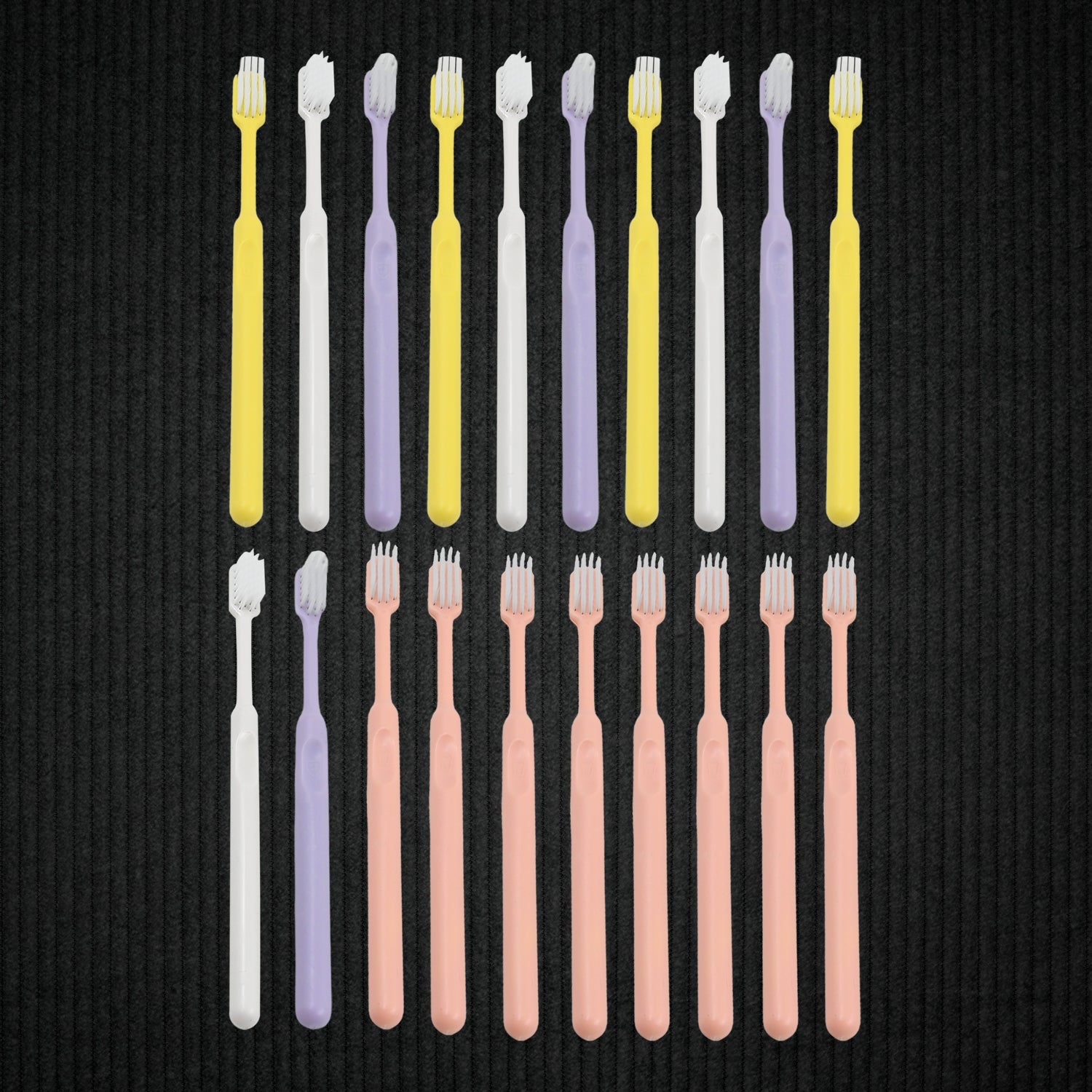 Set of 20 Wukusy plastic toothbrushes with round plastic storage boxes, ideal for travel and daily oral care.