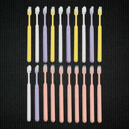 Set of 20 Wukusy plastic toothbrushes with round plastic storage boxes, ideal for travel and daily oral care.
