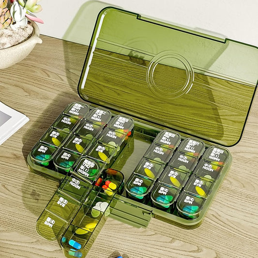 Wukusy portable weekly pill box organizer with 21-grid daily pill keeper for medication storage and easy access.