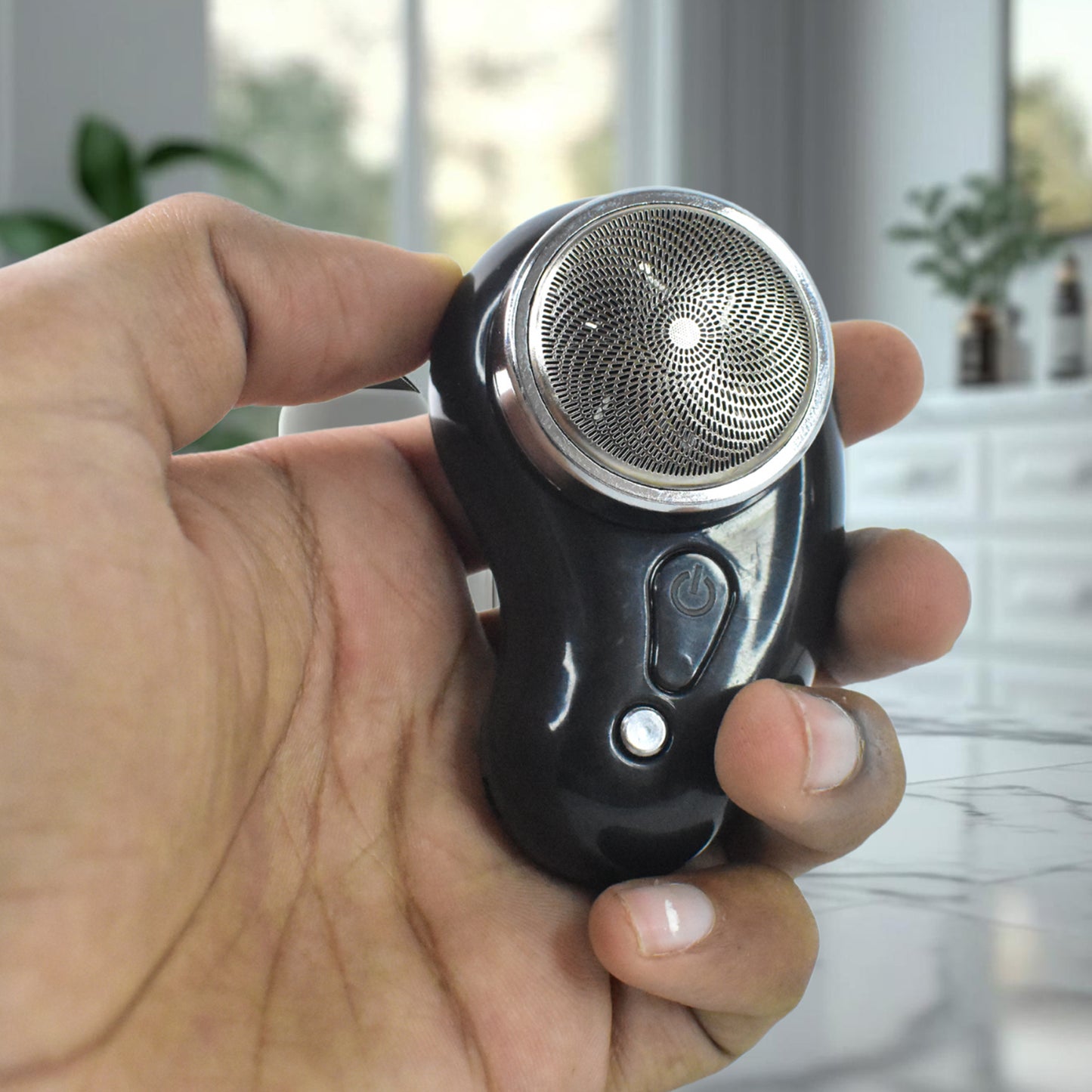 Wukusy portable electric shaver and clipper for trimming, designed for easy grooming and health care use.