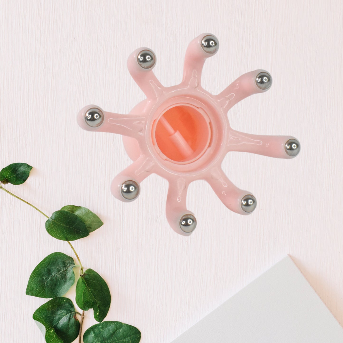 Wukusy scalp relax octopus massager with claw design, ergonomic head and abdomen massager for adult health care use.