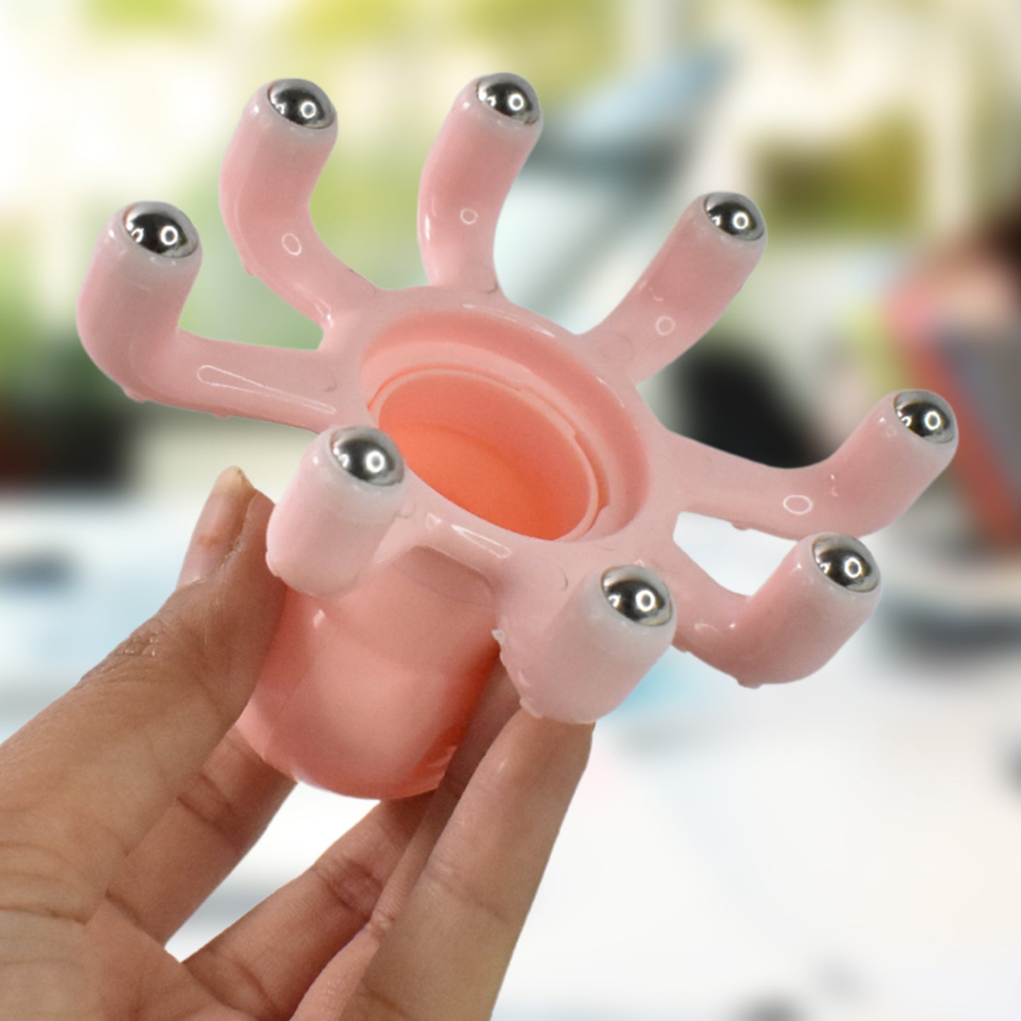 Wukusy scalp relax octopus massager with ergonomic octopus claw design for head and abdomen relief for adults.