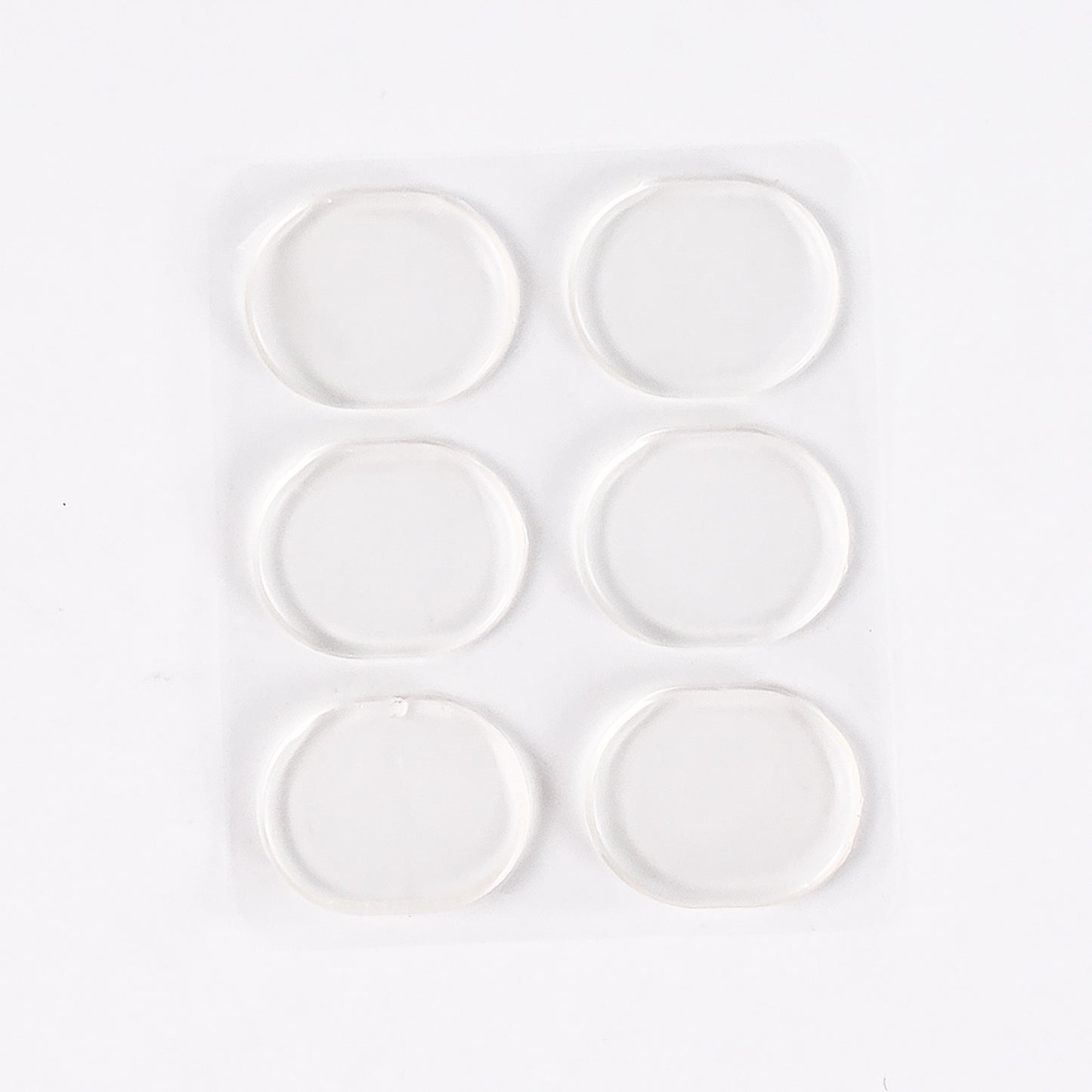 Pair of Wukusy silicone shoe insoles and heel pads for comfort and support, shown in close-up on a plain background.