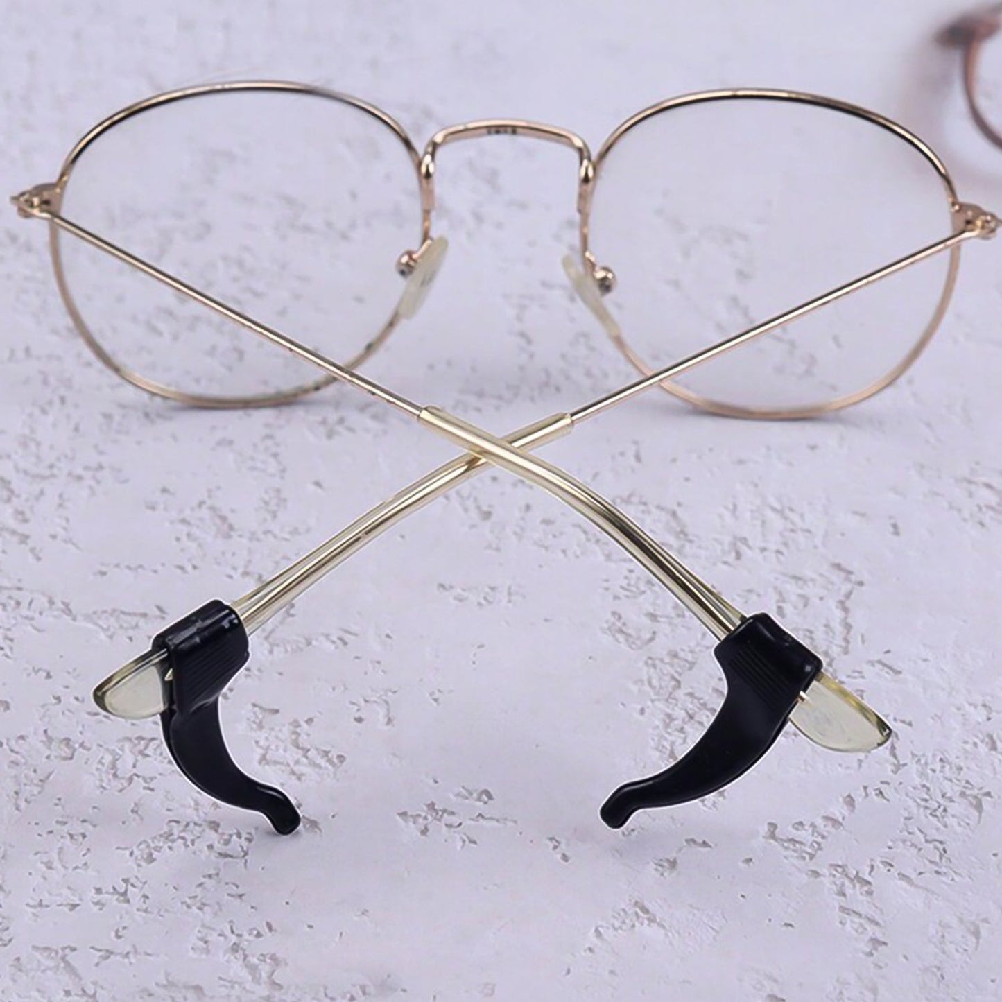 Pair of Wukusy soft silicone glasses ear hooks designed to prevent slipping on eyeglasses.