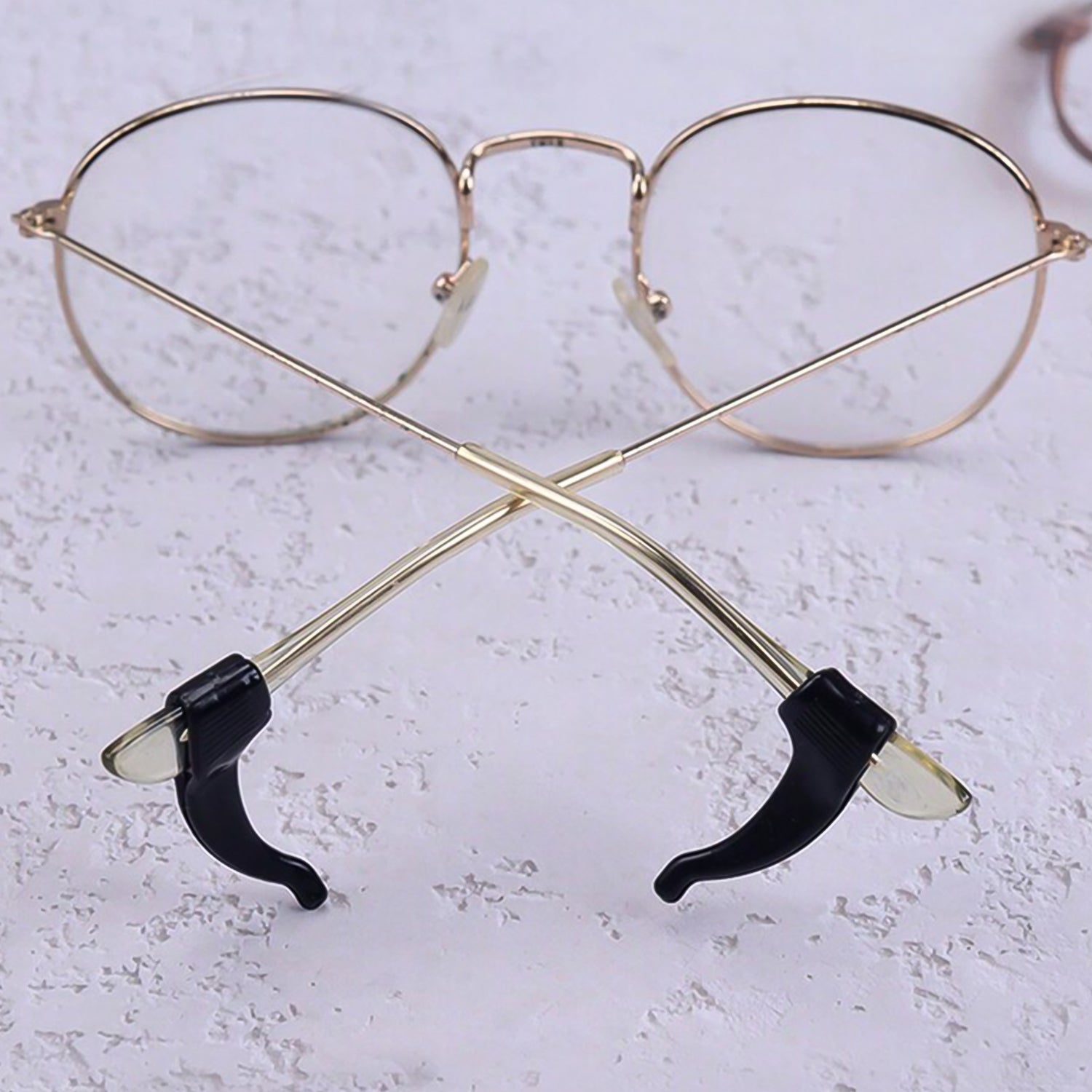 Pair of Wukusy soft silicone glasses ear hooks designed to prevent slipping on eyeglasses.