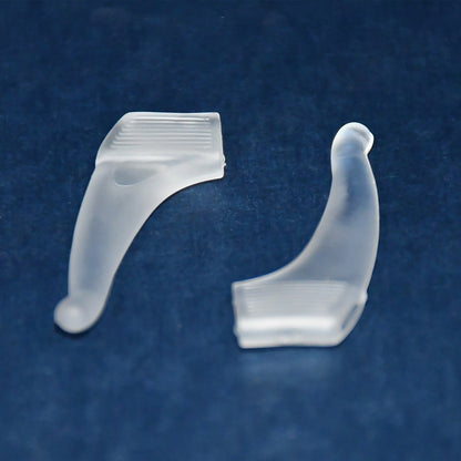 Pair of soft silicone glasses ear hooks by Wukusy, designed for anti-slip comfort on eyeglasses.