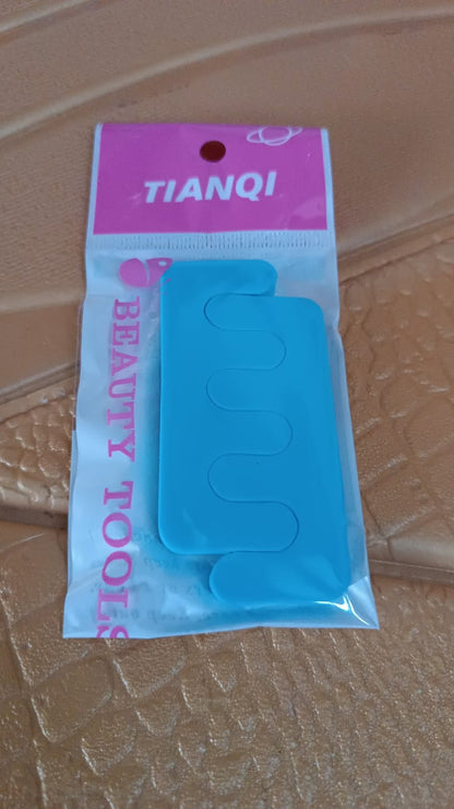 Wukusy sponge toe separators and spacers for toe stretching, ideal for pedicures and foot health, shown in a pair.