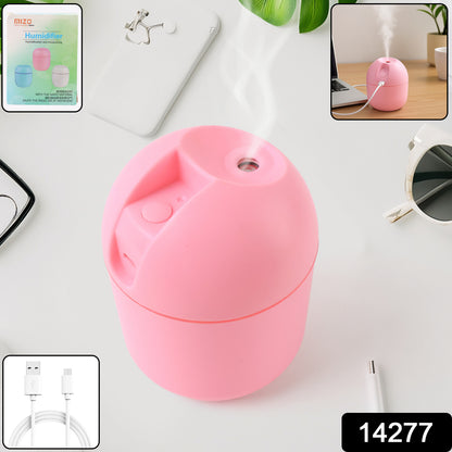 Wukusy USB mini air humidifier for home and office, compact health care device with mist outlet and control button in a modern design.