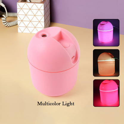 Wukusy USB mini air humidifier for home and office, compact health care device with water tank and adjustable mist nozzle.