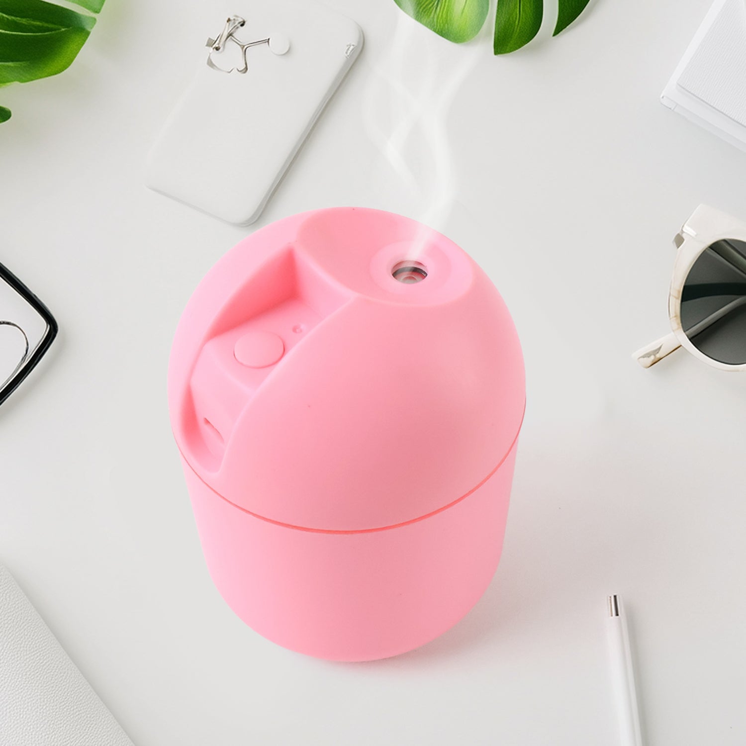 Wukusy USB mini air humidifier for home or office, compact health care device with mist spray showing in the image.