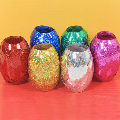 Wukusy curling balloon ribbon roll for gifts, balloons, and crafts, featuring colorful, metallic curling ribbon for decorative projects.