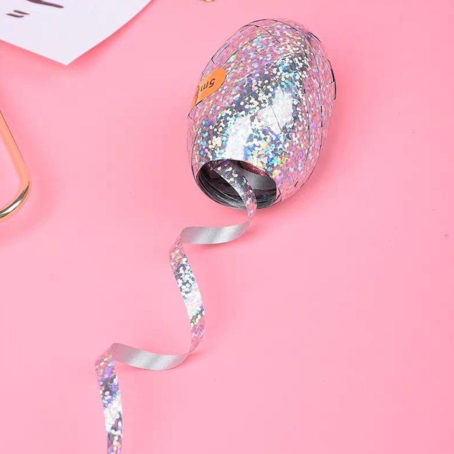 Wukusy curling balloon ribbon roll for gift wrapping, balloons, and crafts, featuring shiny metallic finish for home decor projects.