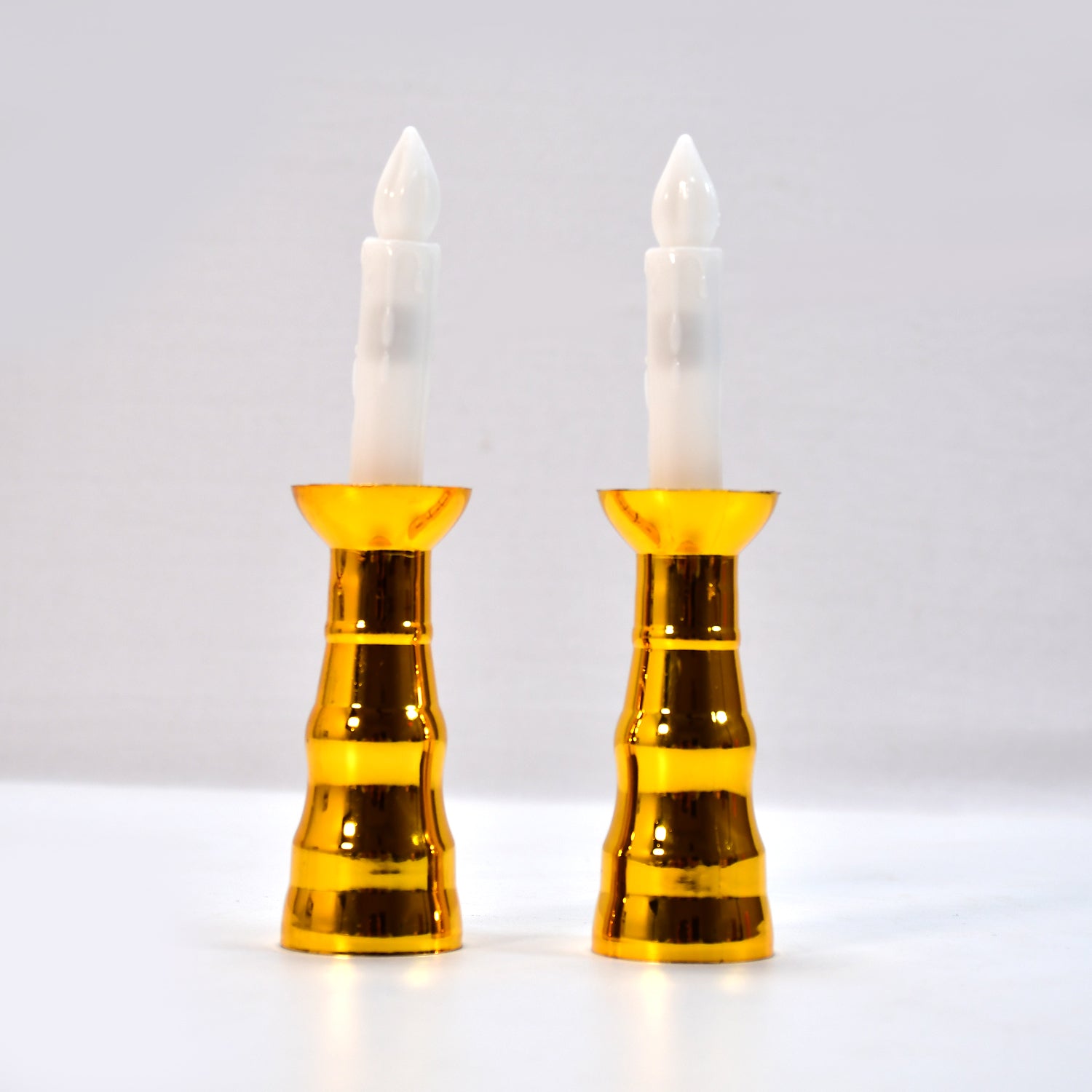 Wukusy 6560 2pcs LED flameless candle lights for indoor window decor, ideal for wedding and party decorations.