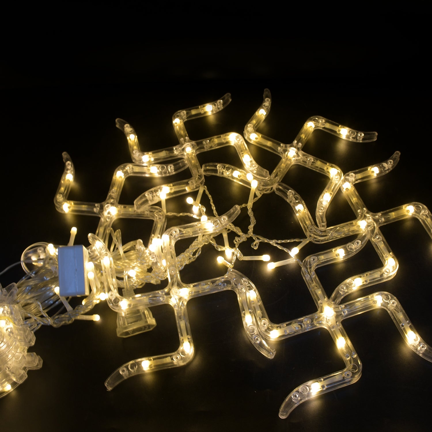 Wukusy Swastik Om decorative string lights with 12 hanging props, 138 LED bulbs, ideal for home Diwali and room decor.