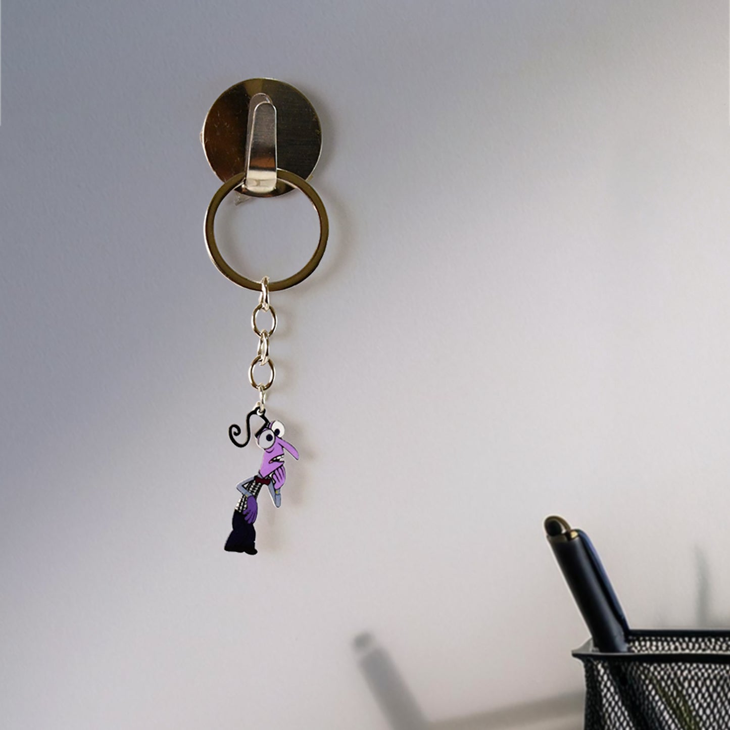 Wukusy cartoon character keychain, vibrant home decor accessory featuring a playful animated design on a keychain.