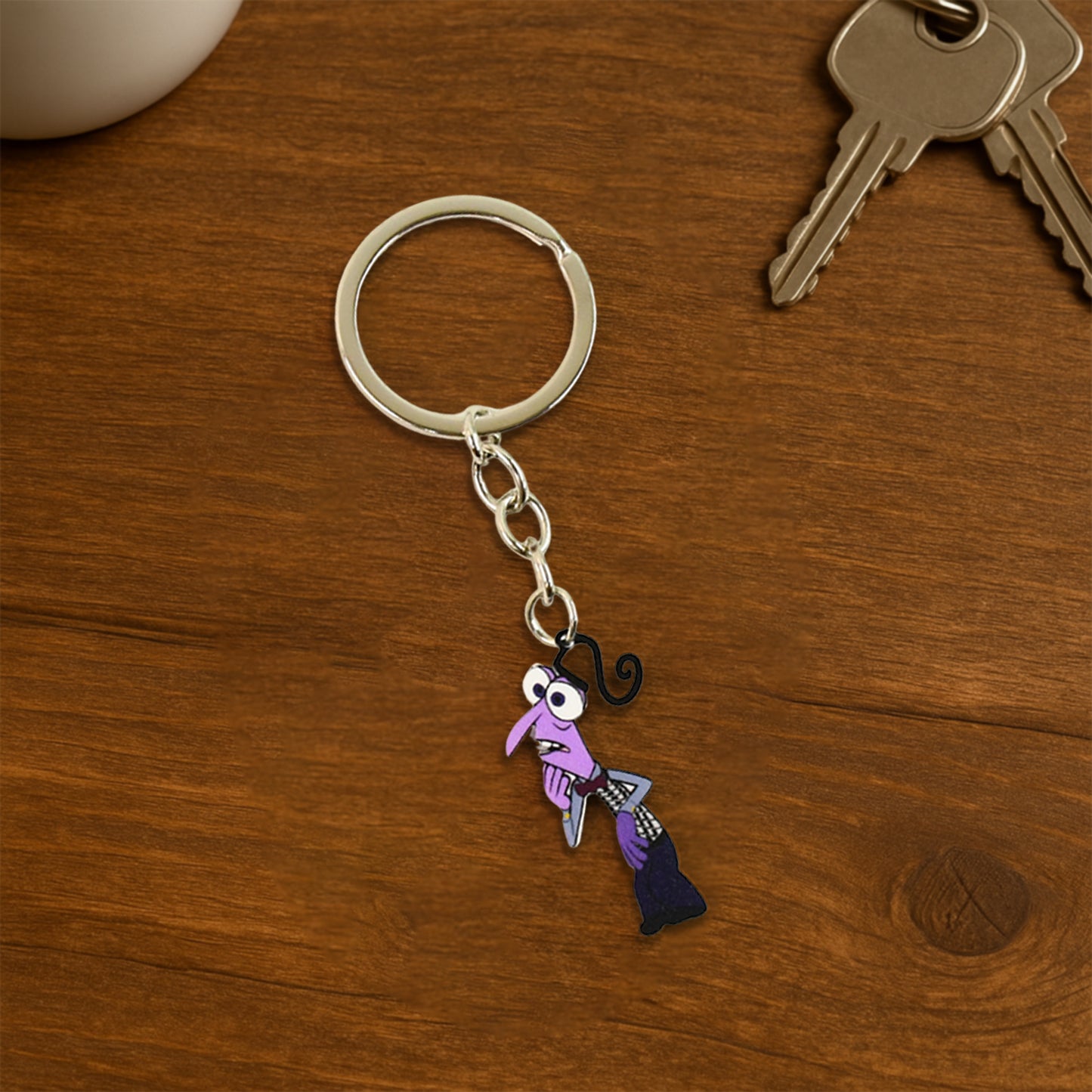 Cartoon character keychain from Wukusy, featuring a colorful, playful design perfect for home decor or accessories.