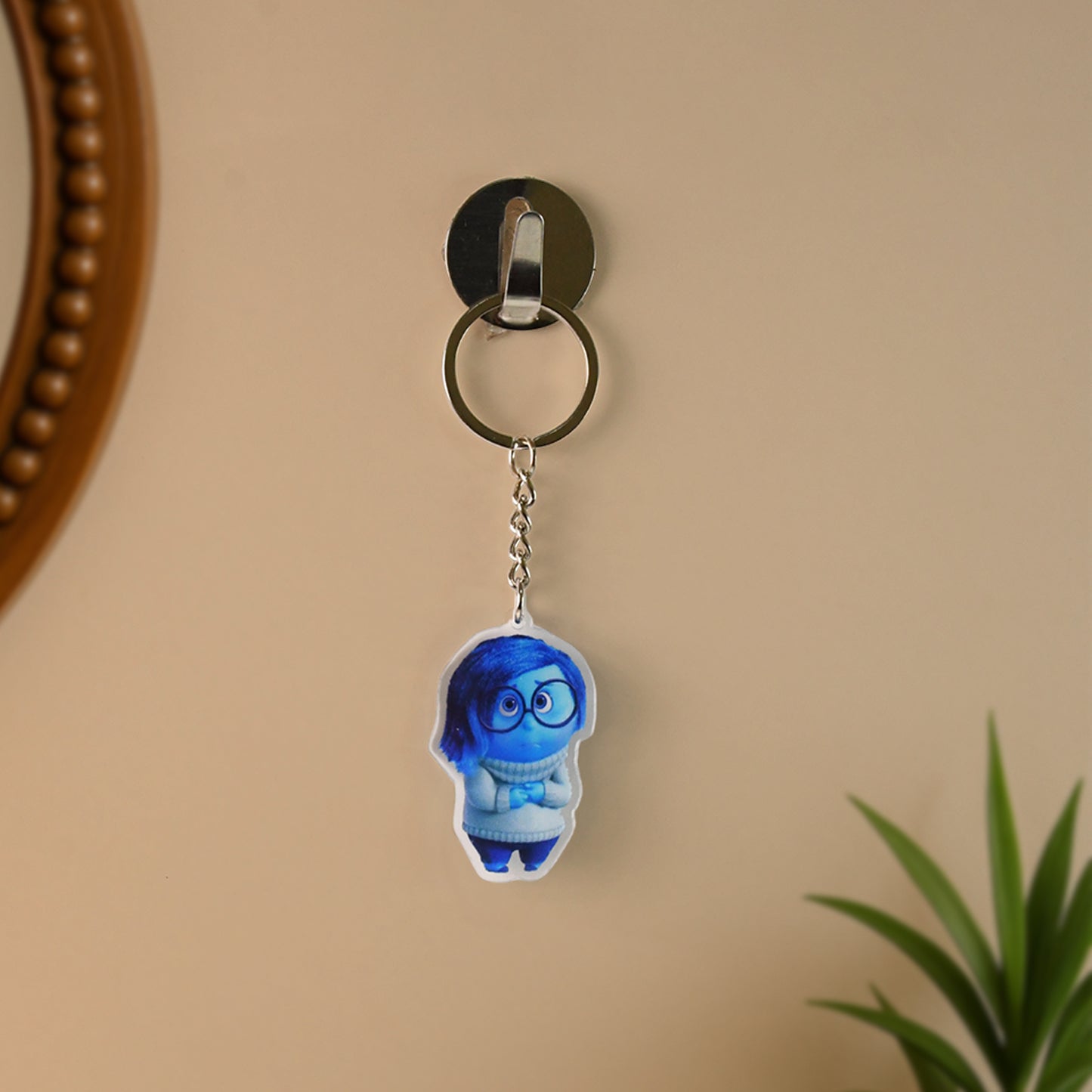 Cartoon character-themed acrylic keychain from Wukusy, featuring colorful design and detailed character illustration, suitable for home decor.