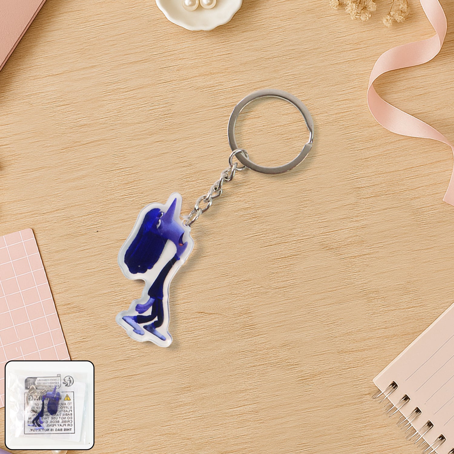 Cute cartoon character acrylic keychain by Wukusy, featuring vibrant colors and playful design for home decor or accessories.