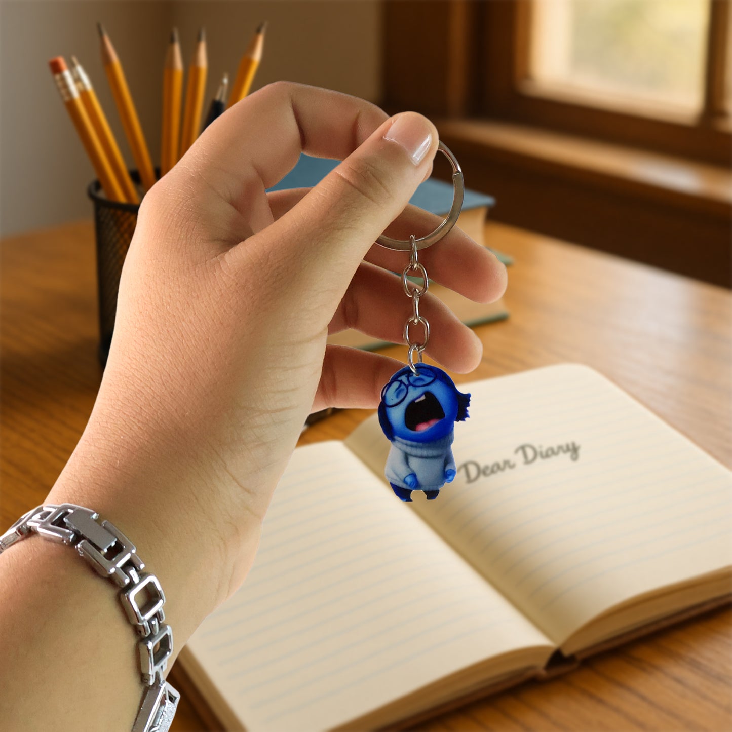 Wukusy cute cartoon girl keychain for kids' bags and stationery, featuring colorful character design and playful decor elements.