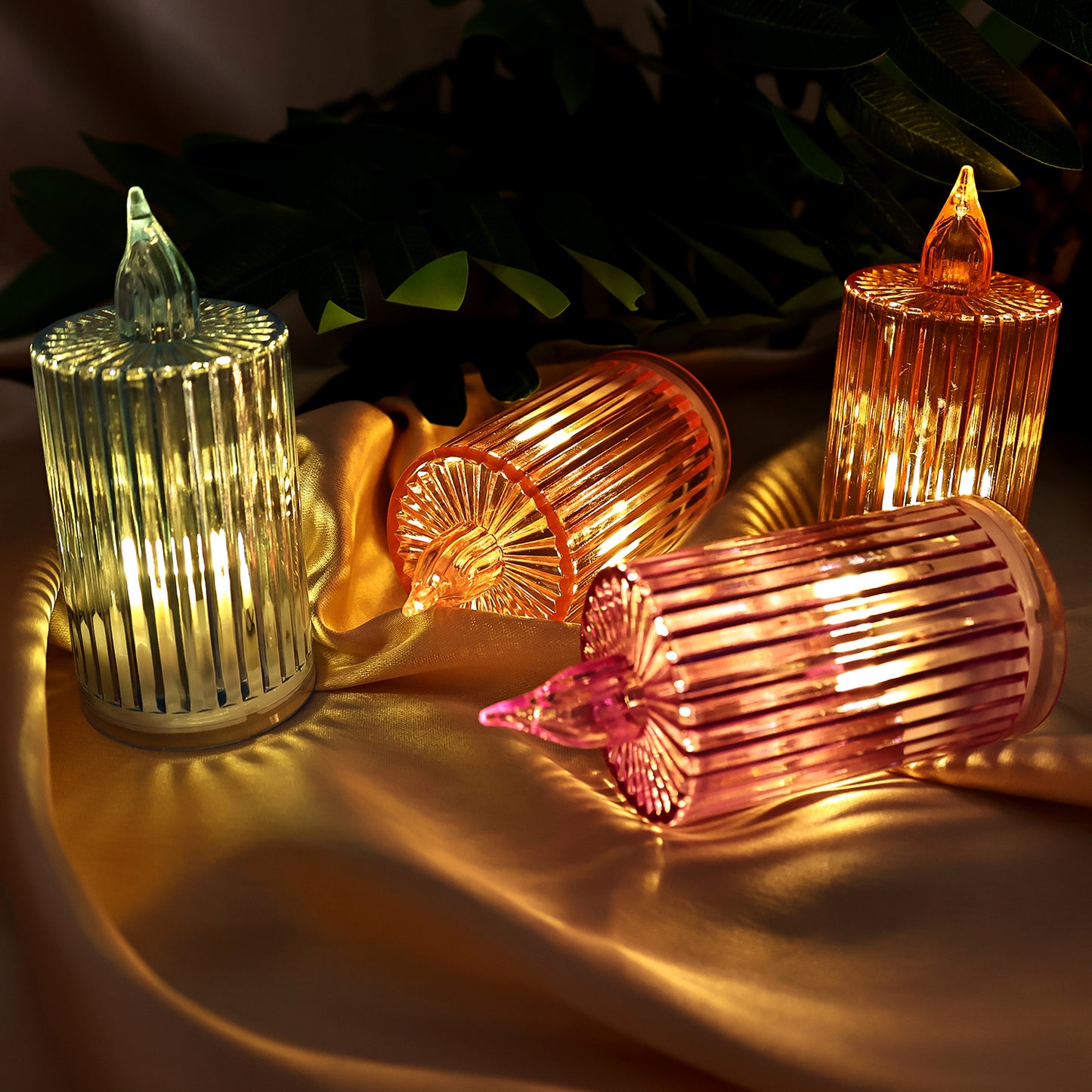 Set of 24 Wukusy decorative flameless electronic LED candles for home decor, featuring warm glowing light.