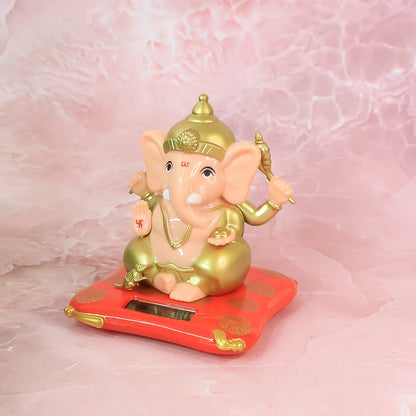 Decorative medium Lord Ganesh idol statue with solar-powered base for home decor, featuring intricate design and vibrant details.