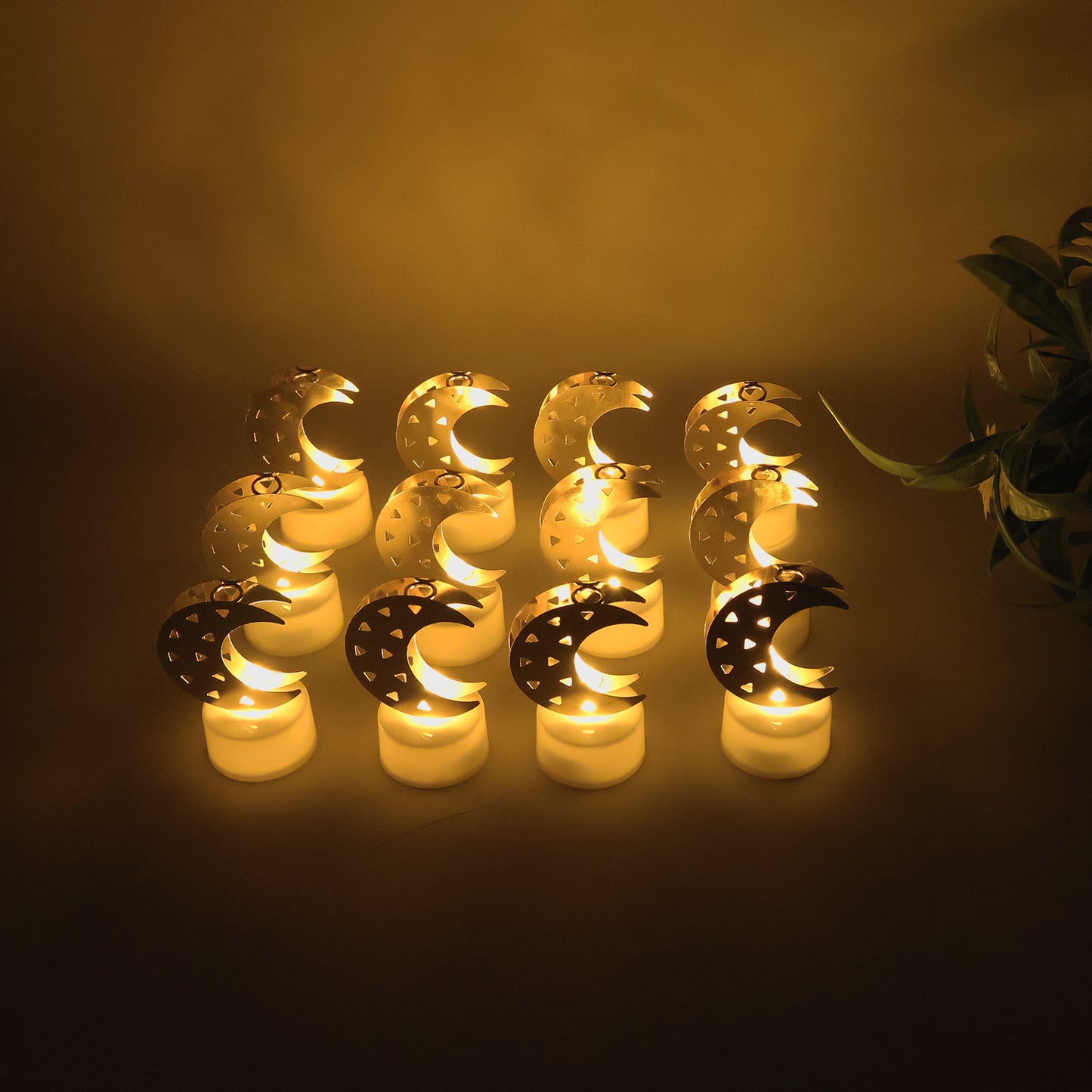 Set of 12 Wukusy decorative moon-shaped flameless LED candles for home decor, featuring warm, flickering light.