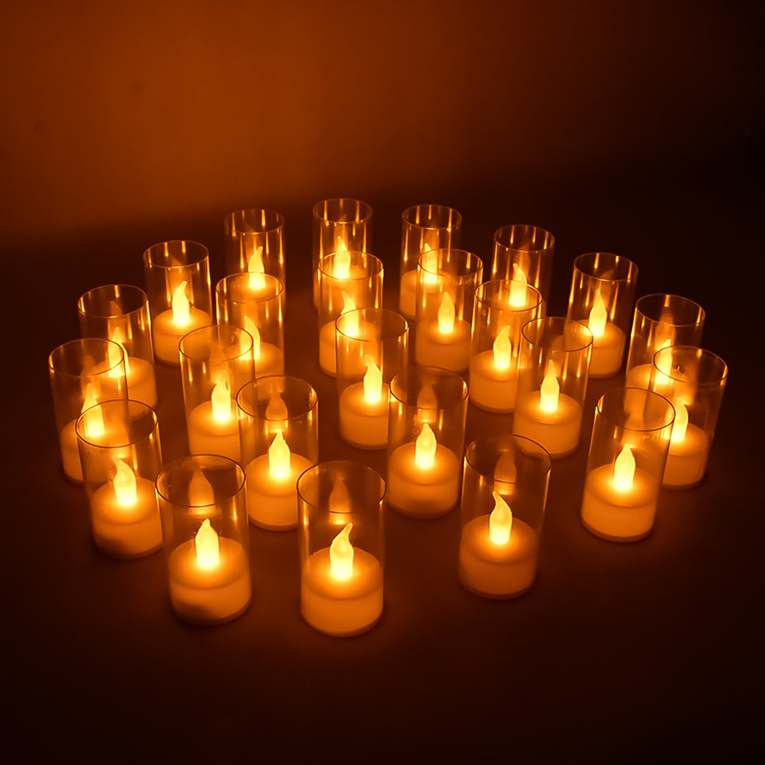 Set of 24 Wukusy flameless LED candles with transparent plastic covers, ideal for home decor and safe ambient lighting.