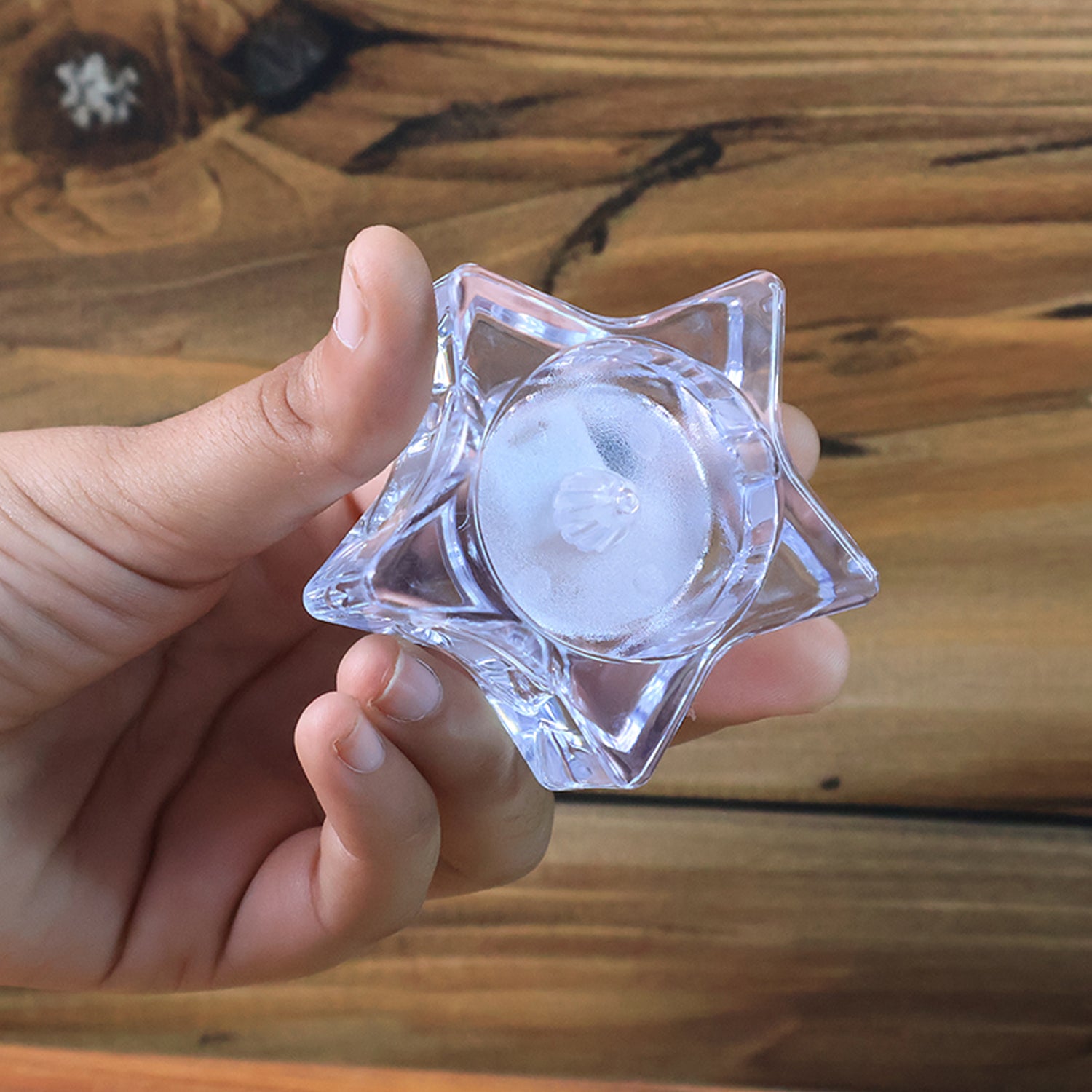 Set of four Wukusy flameless star-shaped LED candles for home decor, safe and decorative lighting for festive or cozy settings.