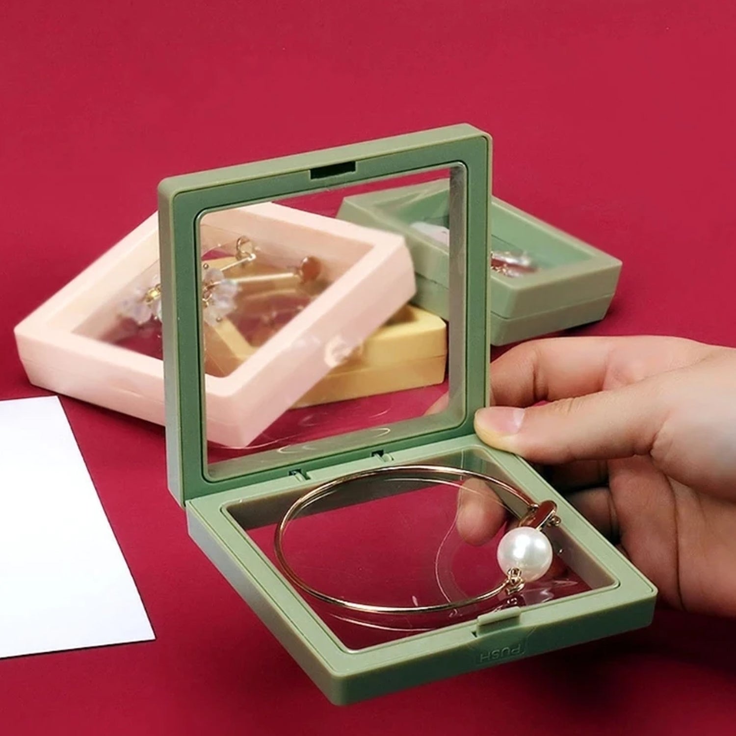 Wukusy 3D floating frame display case for gift packaging, showcasing a modern home decor piece with transparent glass and black frame.