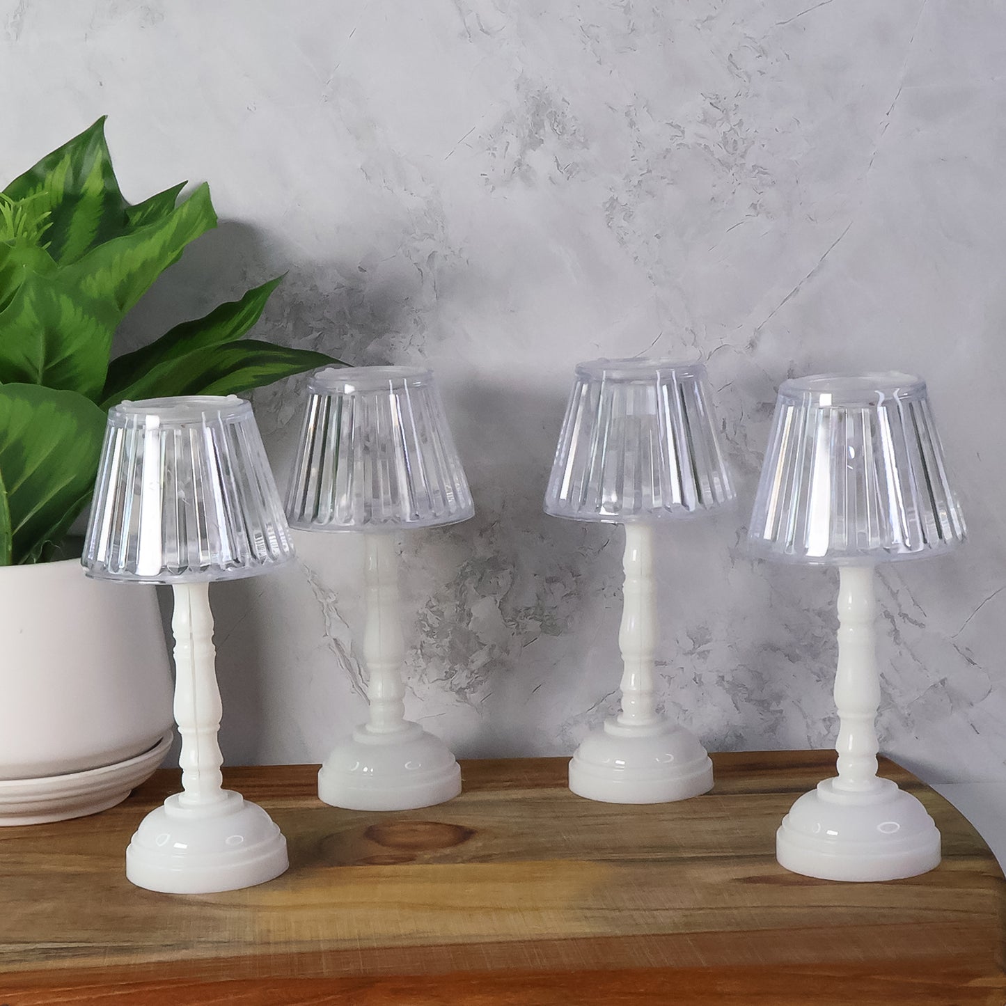 Set of four Wukusy LED crystal table lamps for home decor, featuring elegant design with glowing crystal accents.