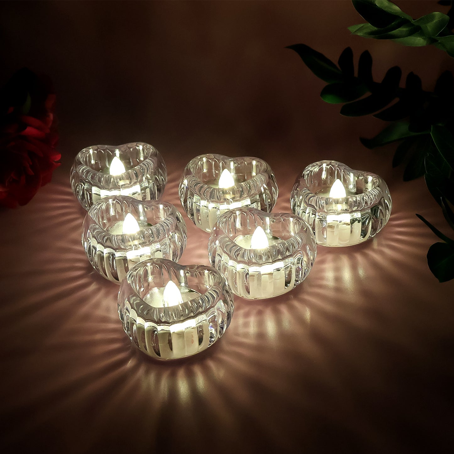 Six Wukusy LED crystal tealight candles for home decor, flameless and decorative, ideal for creating a cozy ambiance.