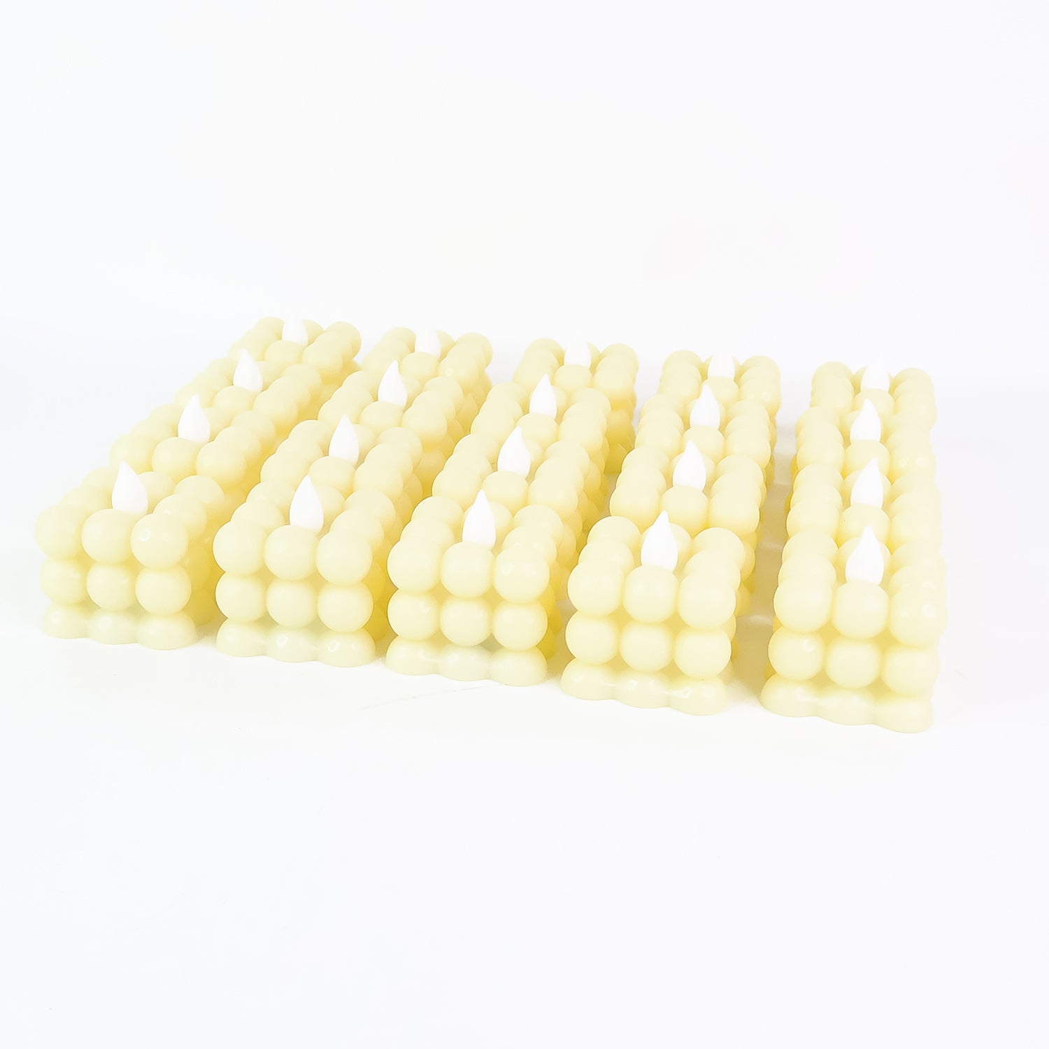 Set of 24 Wukusy LED flameless cube decorative candles for home decor, with warm, flickering light and realistic candle appearance.